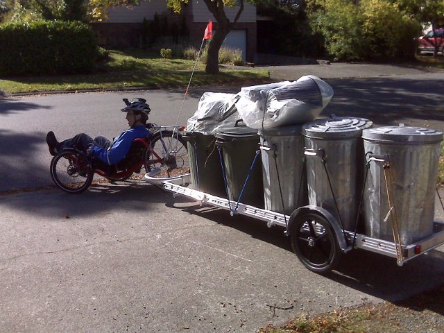 trike pulling a 96A bicycle cargo trailer loaded with recyclables