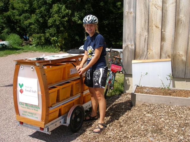 Making deliveries with their 64A trailer.  They custom-built the wood cargo rack themselves.