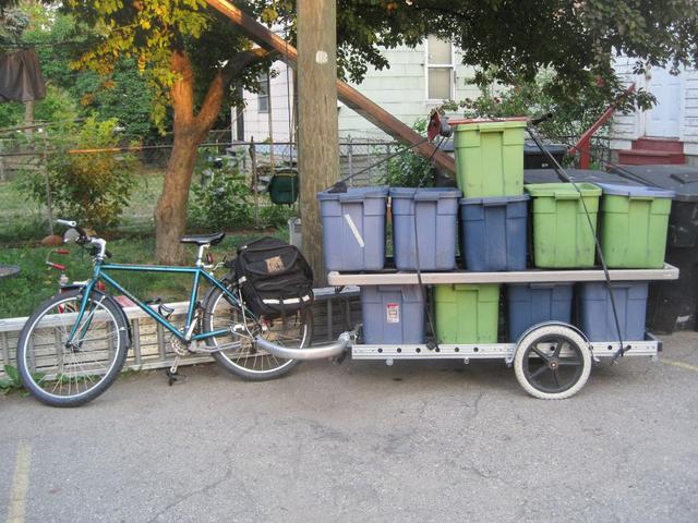 Going to market with a vending table and bins full of produce on a 64A